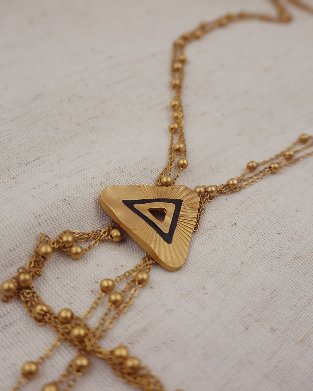Triangle Rayz Neckpiece